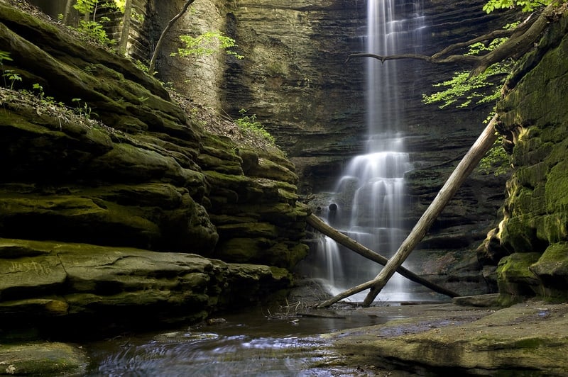 A tall beautiful waterfall located on an Illinois nature trail.
