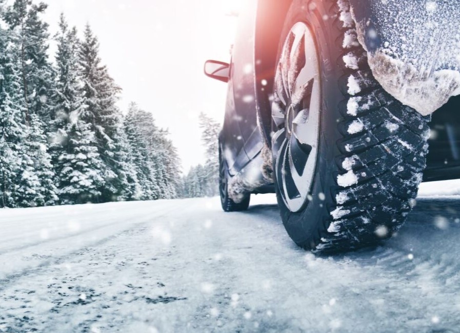 New winter tires driving seamlessly on snow and icy roads. Do you have the right tires for the upcoming winter season?